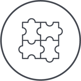Outline of four interconnected puzzle pieces inside a circle.