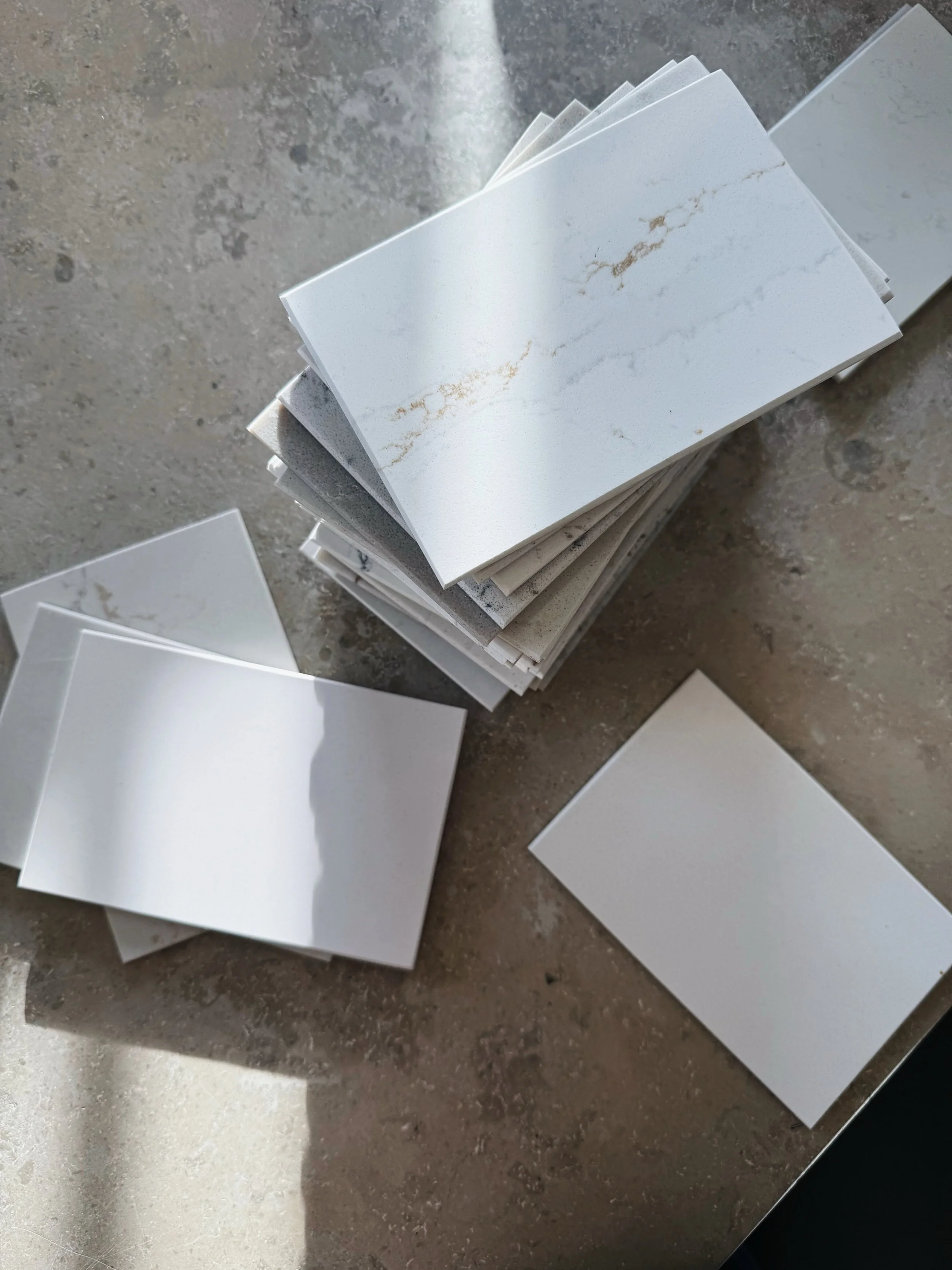 Materials, textures, touch 🩶 

Good design always starts here. I love getting close to samples, watching how they change with the light throughout the day. 

Edges soften, colors deepen and sometimes a soft patina appears. Materials are never static