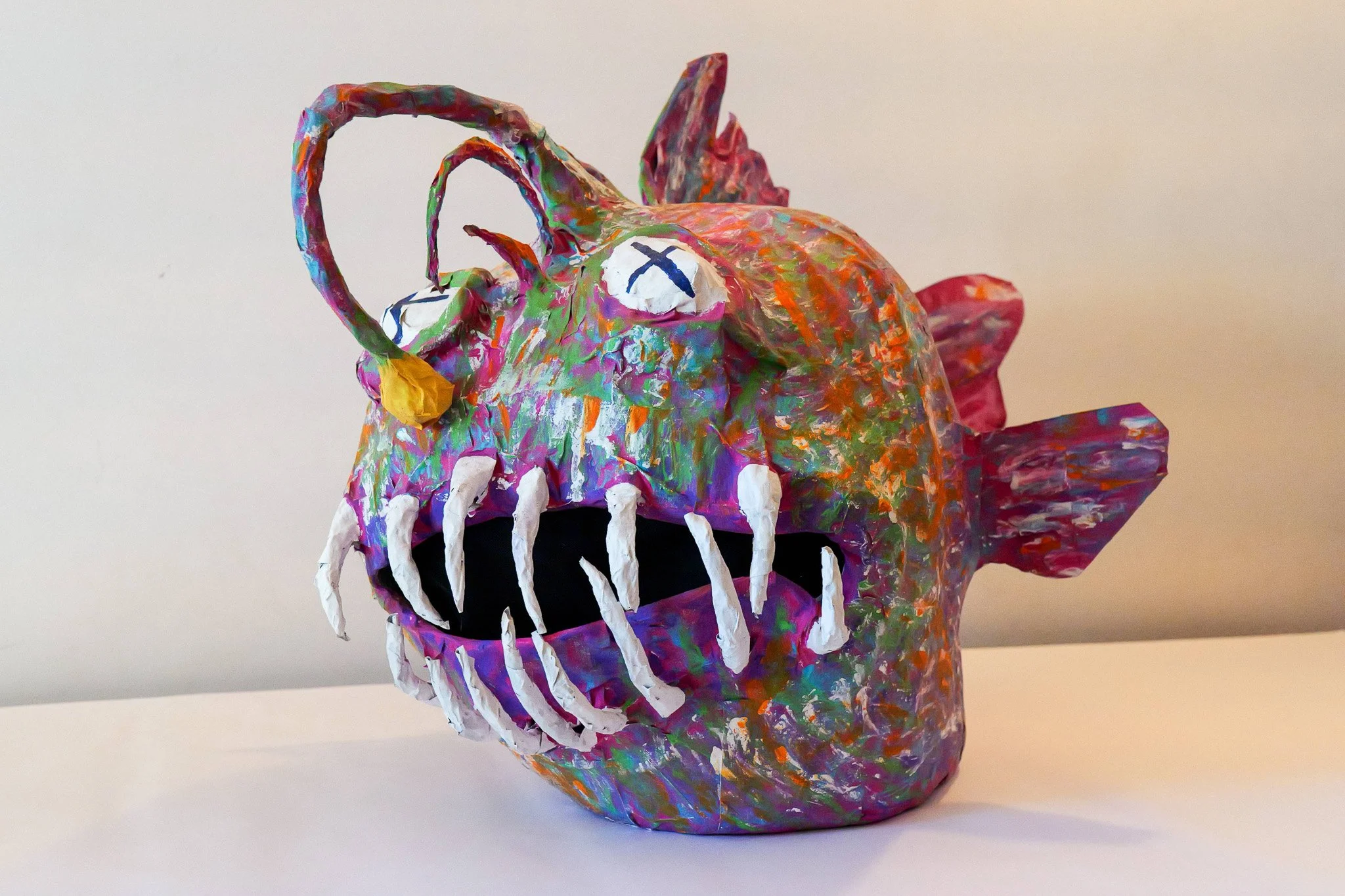 Fully functional Angler Fish Head mask made out of Papier Mache and painted with acrylic paint. 