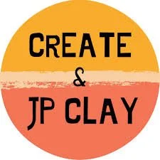 A circular logo with a yellow top half and a red bottom half, featuring black text that reads 'CREATE & JP CLAY'