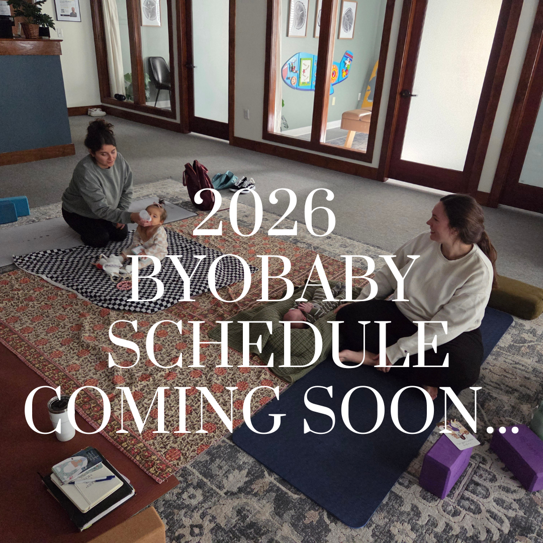 pregnant woman sitting doing yoga