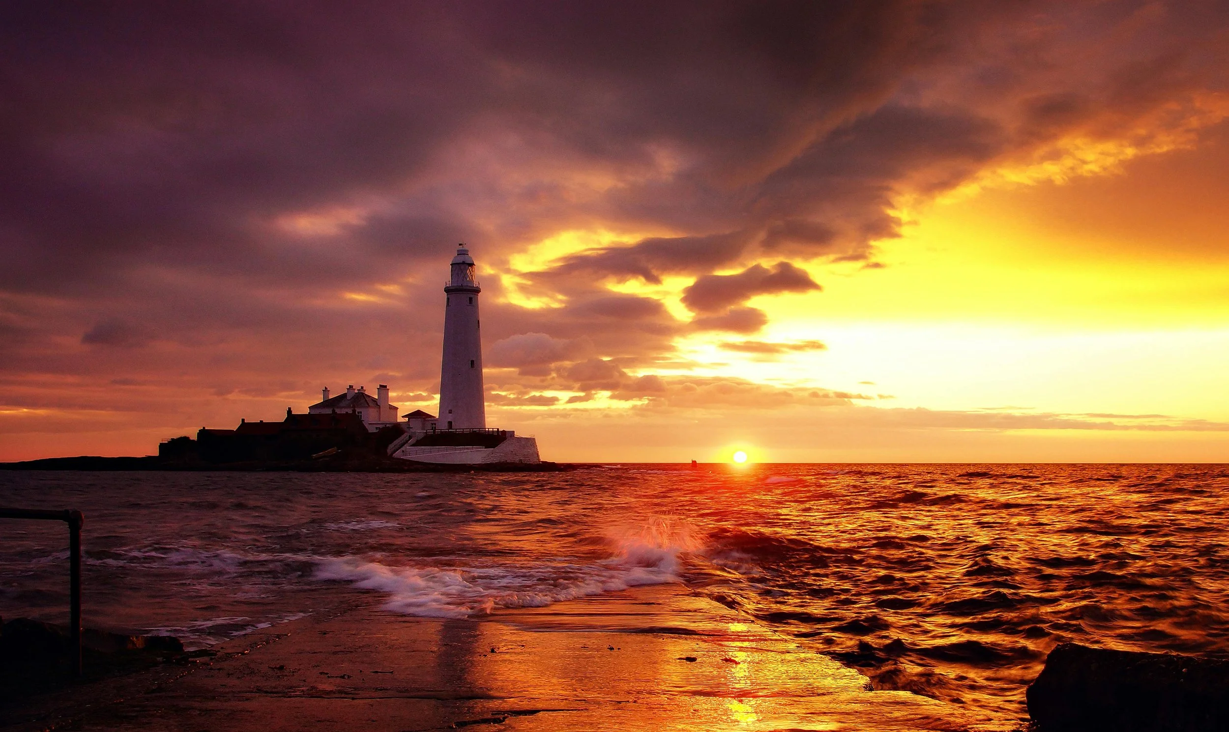 Lighthouse and pier leading into sunset, representing leadership, clarity, and progress.