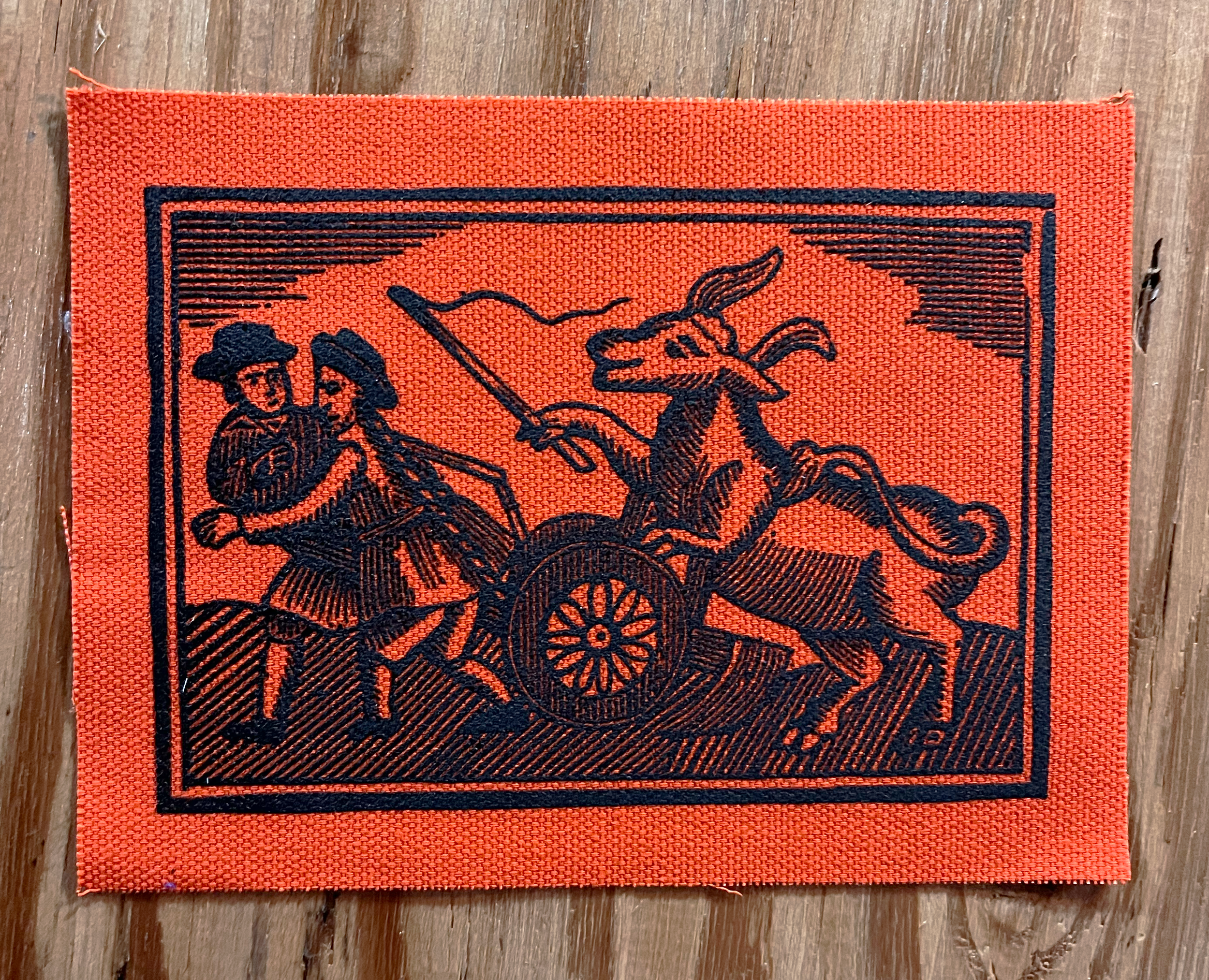 Bull Farmer Small Patch Black on Orange.png