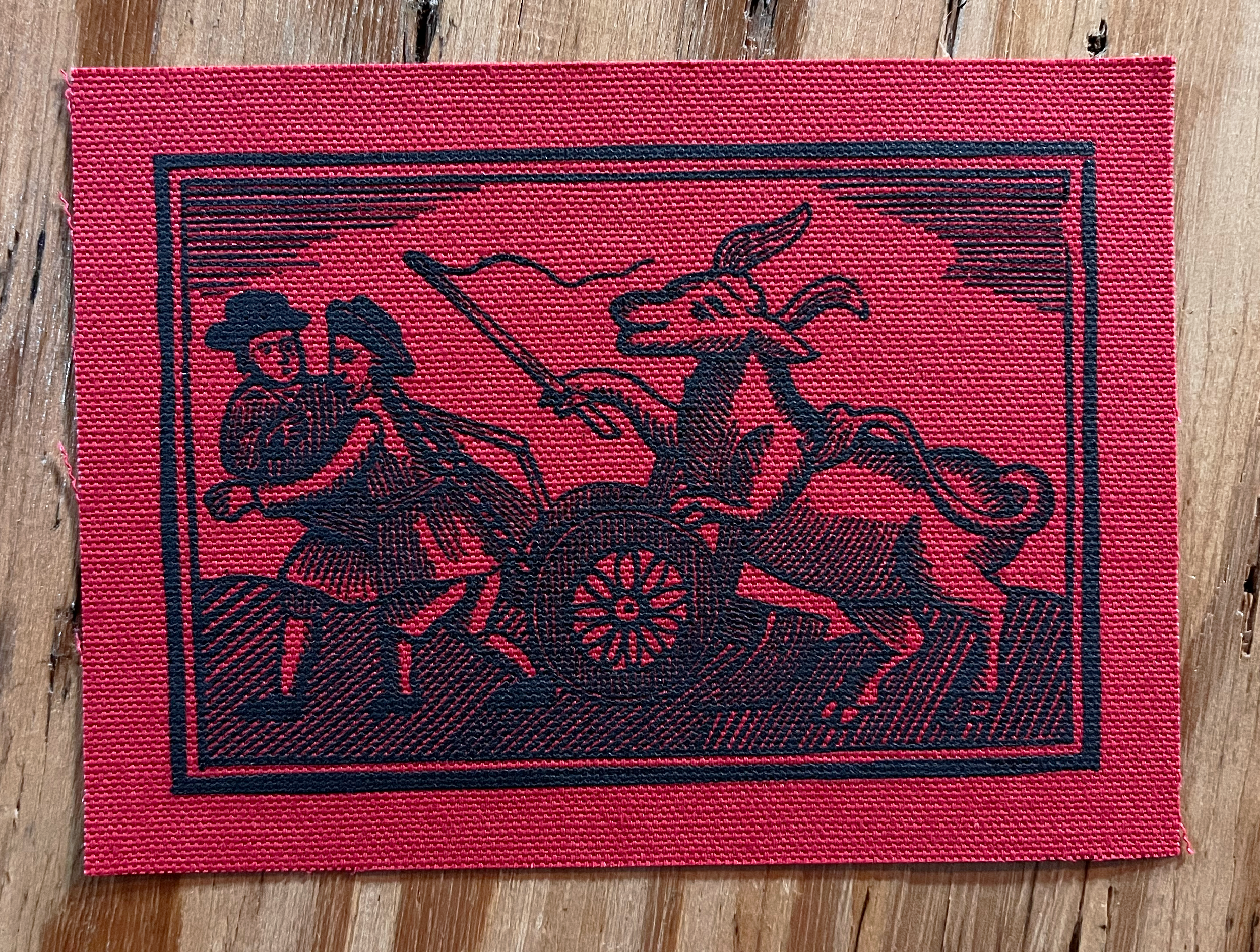 Bull Farmer Small Patch Black on Red.png