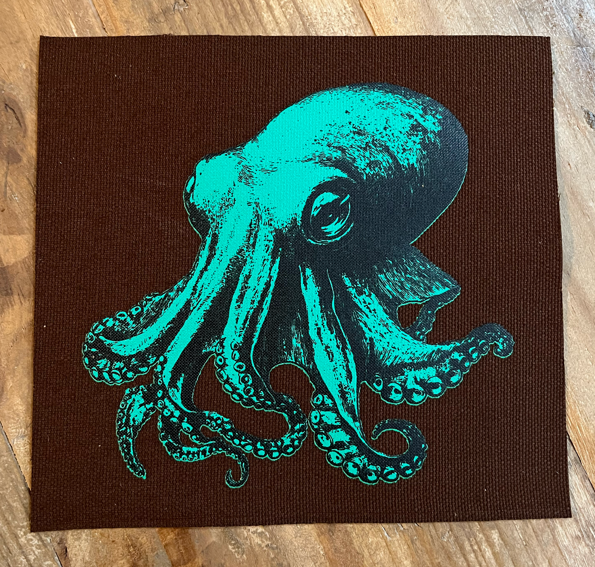 Octopus Small Patch Green on Dark Brown.png