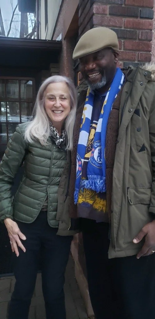 A photo of Judge Marjorie Olds standing with Dr. Aloja Airewele.