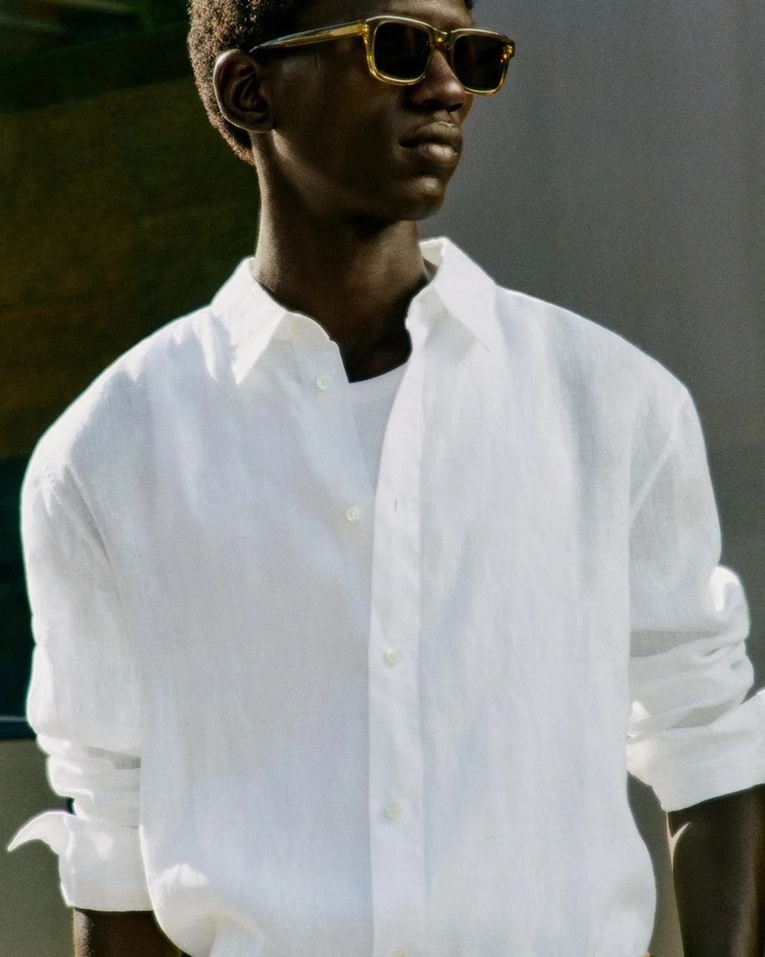 Moustapha Sy by Daniel Shea for COS Summer 2023 Ad Campaign. Hair Stylist: Ryan Mitchell. Makeup Artist: Siddhartha Simone. Art Director: Andy Knappett