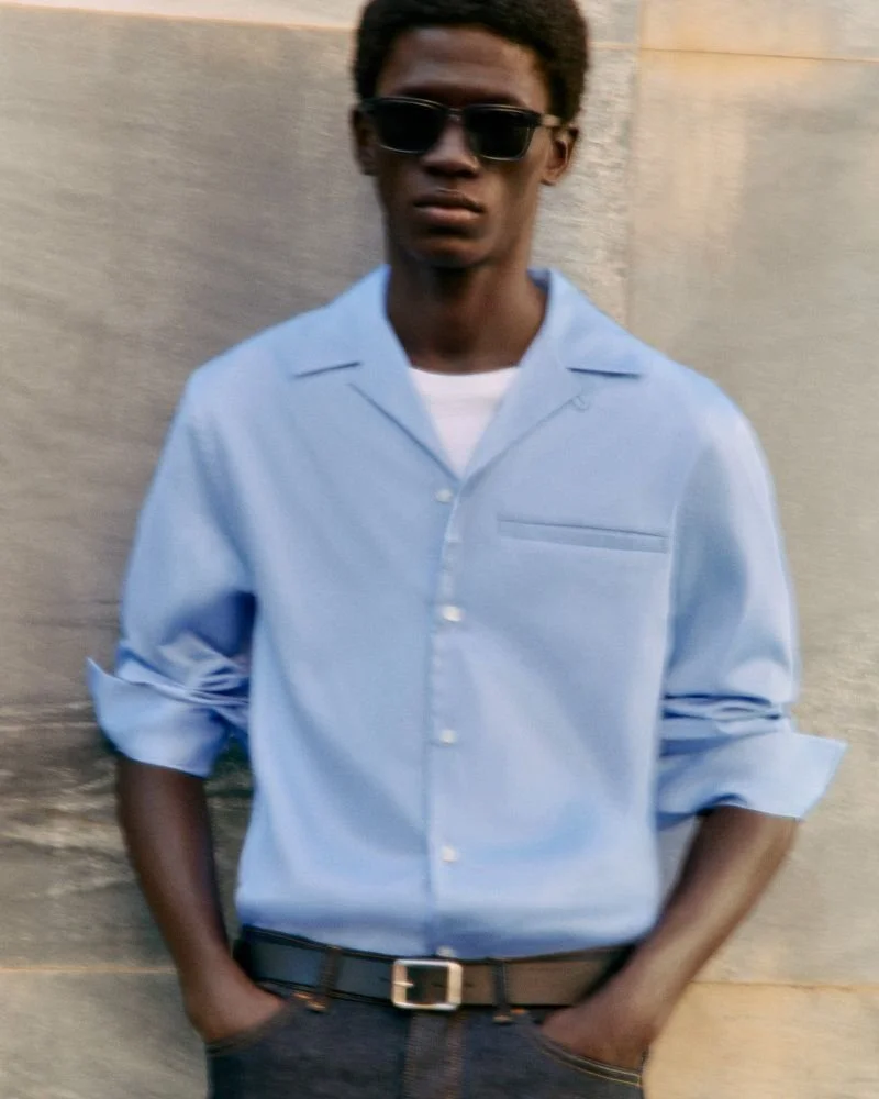 Moustapha Sy by Daniel Shea for COS Summer 2023 Ad Campaign. Hair Stylist: Ryan Mitchell. Makeup Artist: Siddhartha Simone. Art Director: Andy Knappett