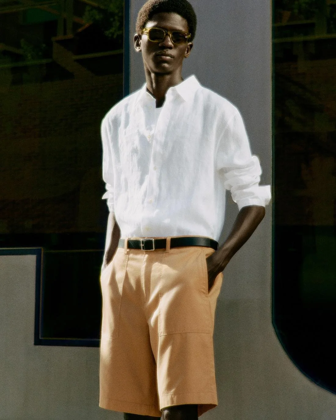Moustapha Sy by Daniel Shea for COS Summer 2023 Ad Campaign. Hair Stylist: Ryan Mitchell. Makeup Artist: Siddhartha Simone. Art Director: Andy Knappett