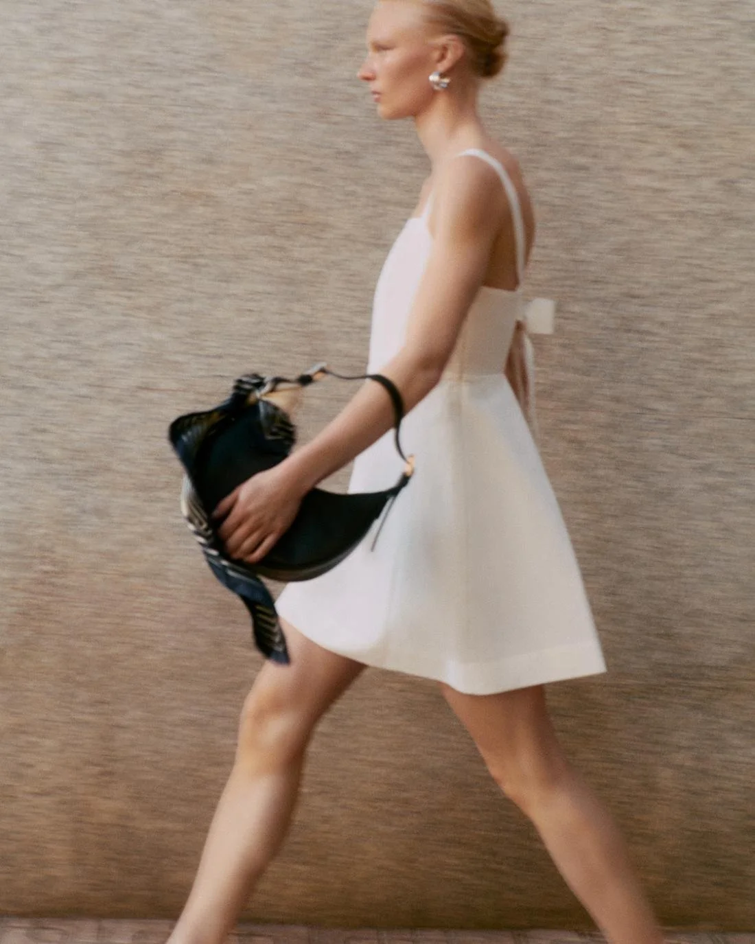 Vilma Sjoberg by Daniel Shea for COS Summer 2023 Ad Campaign. Hair Stylist: Ryan Mitchell. Makeup Artist: Siddhartha Simone. Art Director: Andy Knappett