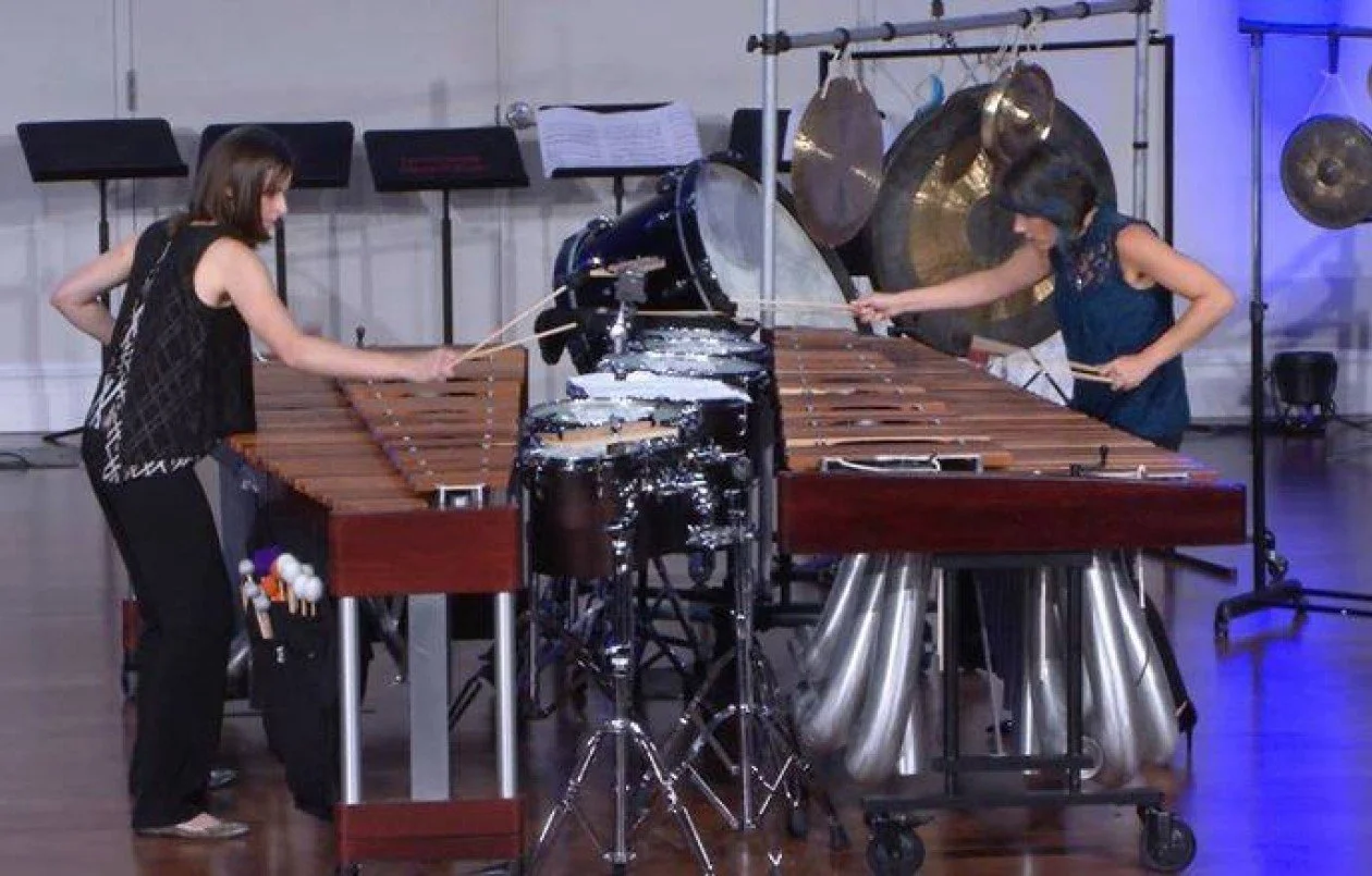 Photograph of Escape Ten Duo performing marimbas and tom-toms.