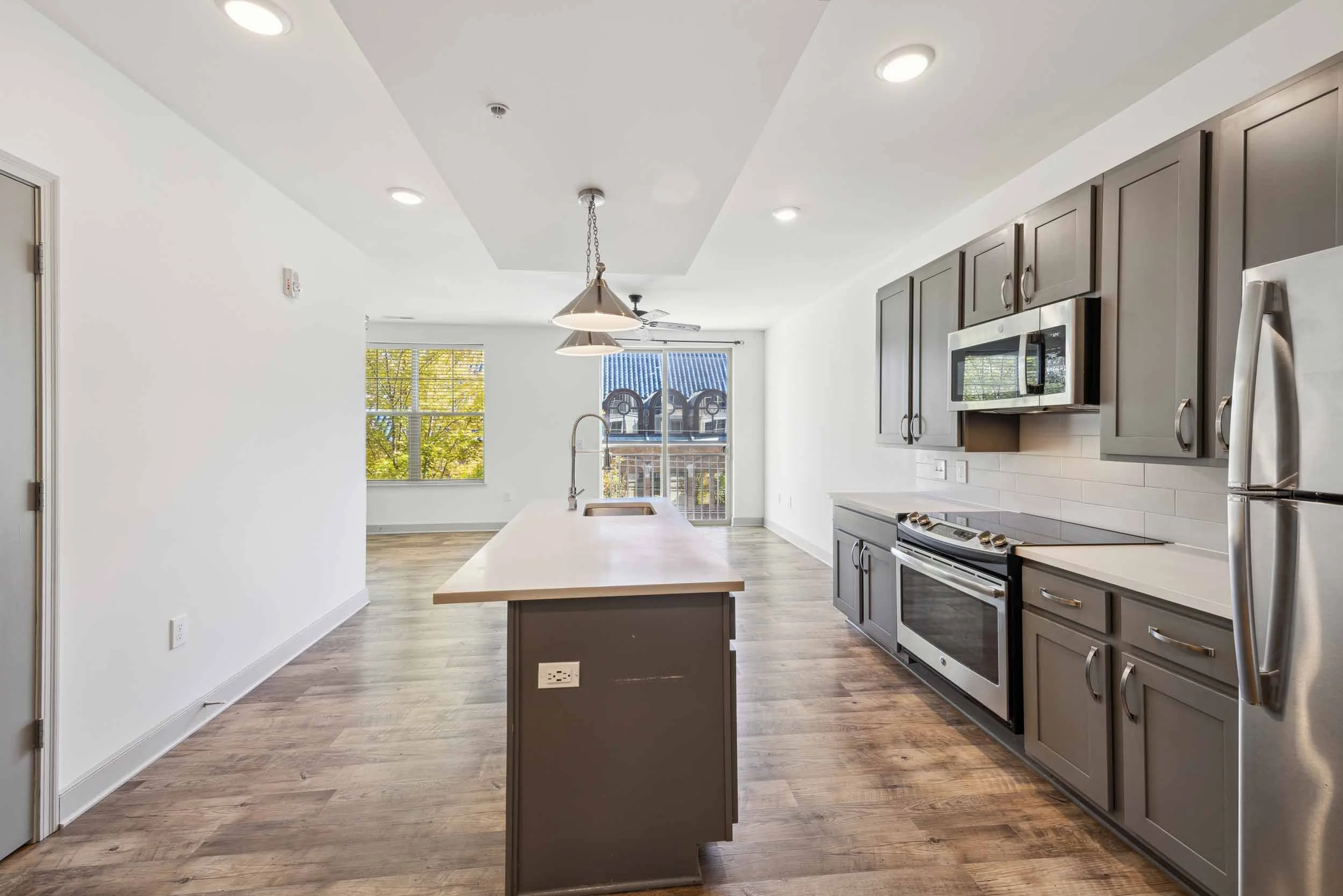 The Jerome | Victorian Village Apartments in Columbus, OH | Kitchen and Living Room