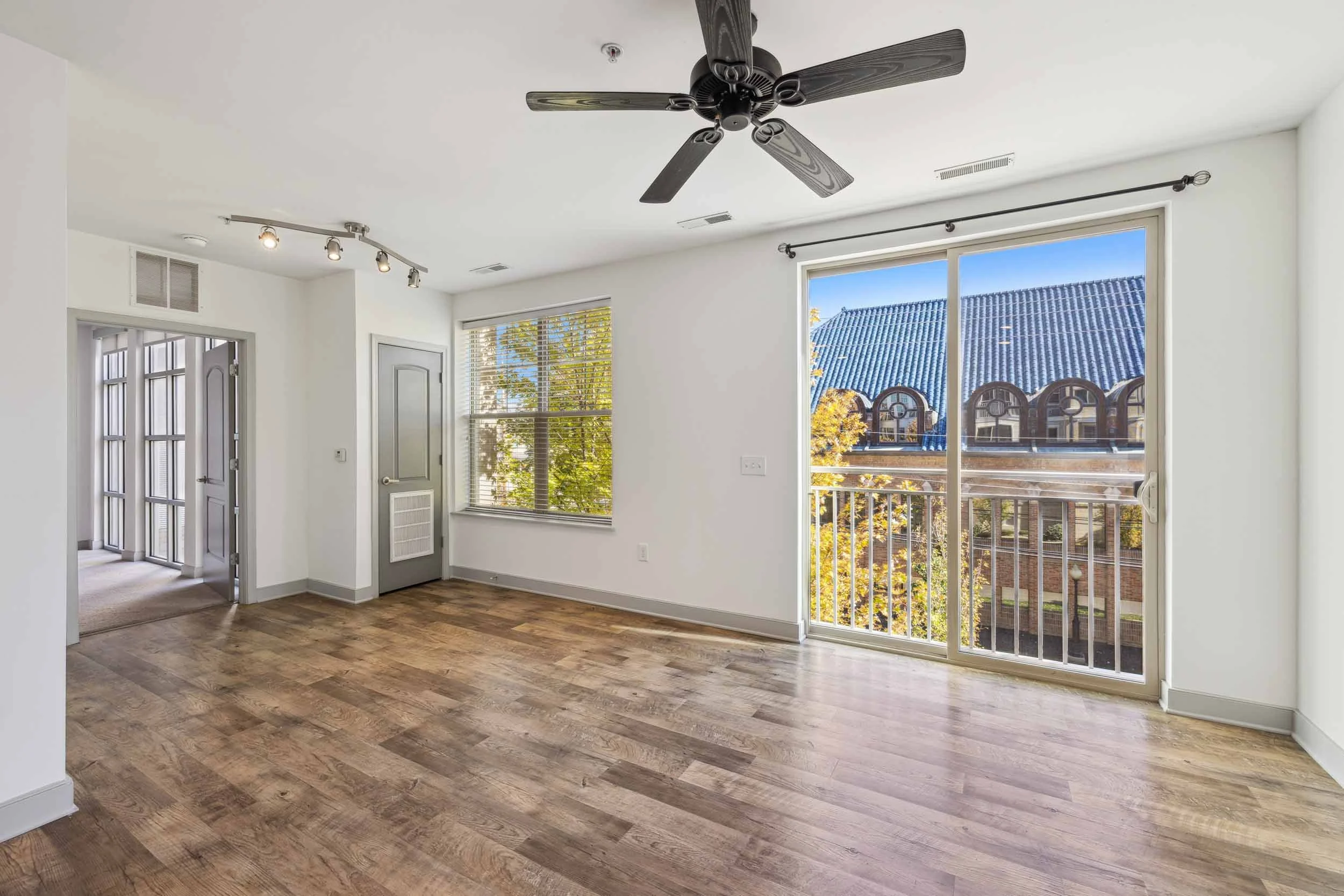 The Jerome | Victorian Village Apartments in Columbus, OH | Living Room and Balcony