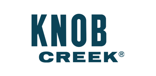 Knob Creek logo with bold blue text on a black background.