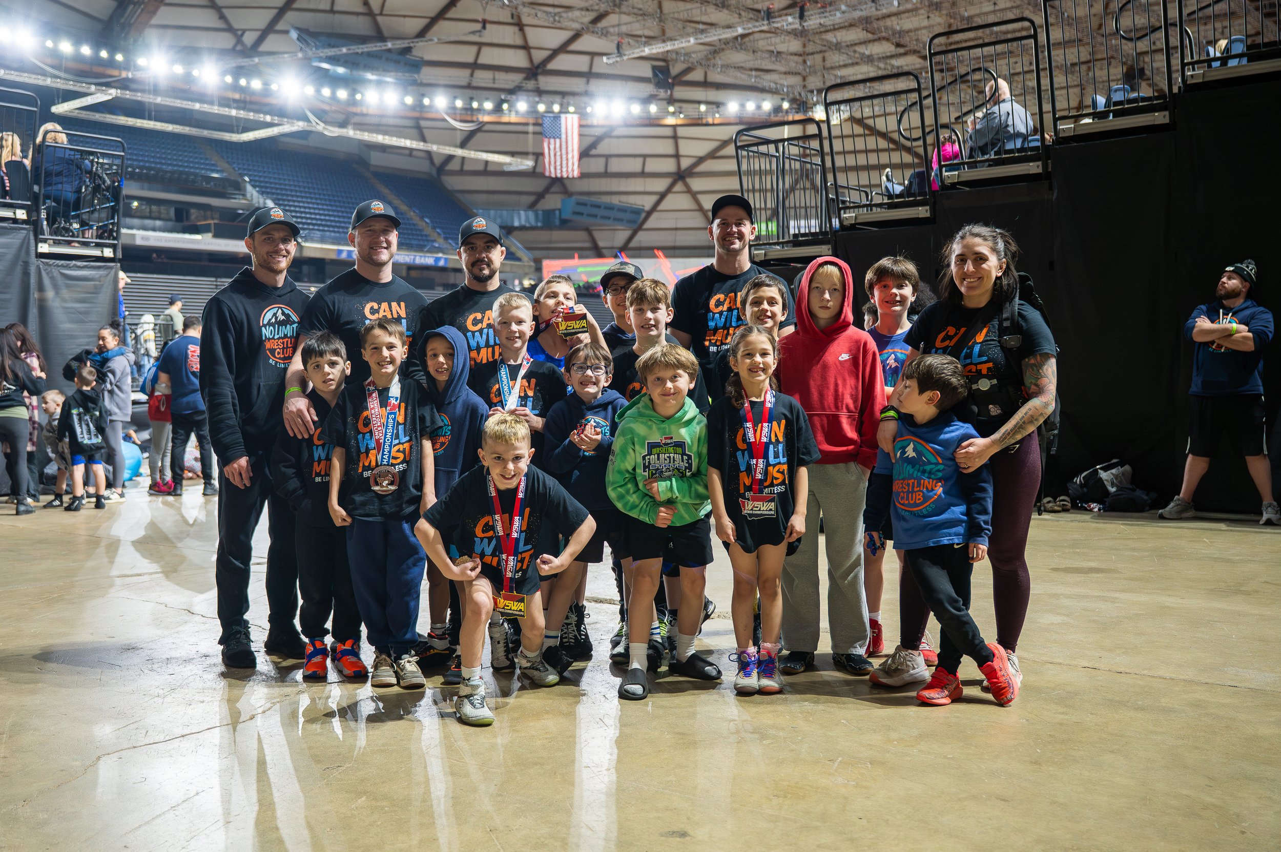 Youth wrestling team together at a wrestling event