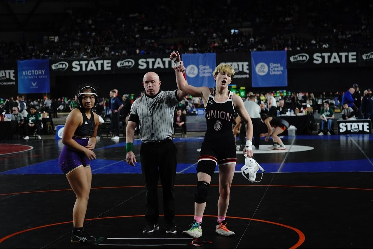 Youth athlete completing summer conditioning run outdoors to maintain structure and recovery during offseason training