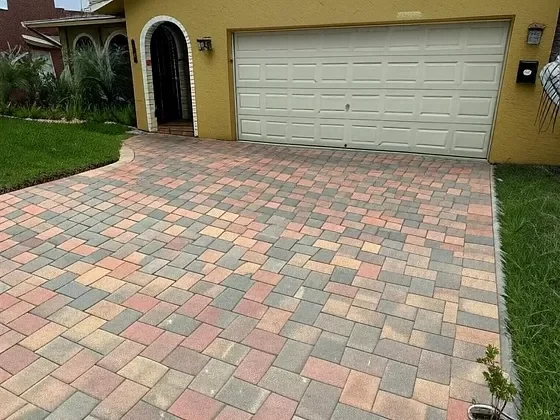 Completed outdoor living refresh with cleaned and sealed pavers in Palm Beach, FL