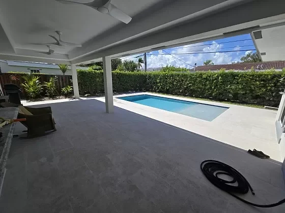 Pool deck pavers installed with precise alignment for outdoor living in Jupiter, FL