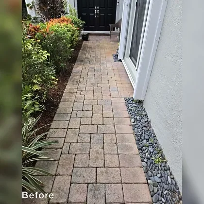 Sunken paver driveway before repair at a Miramar, FL home