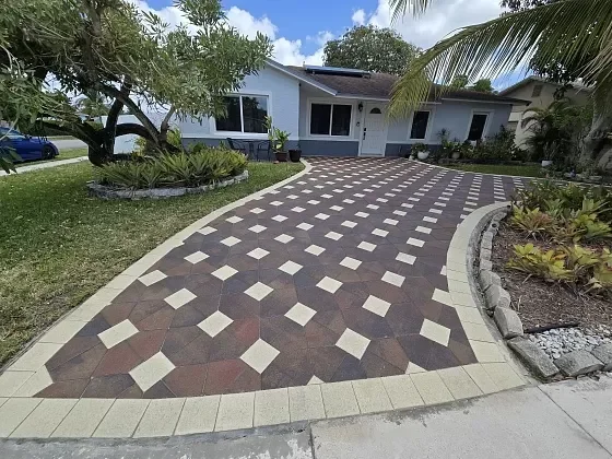 Paver driveway pattern cleaned and restored in North Lauderdale, FL