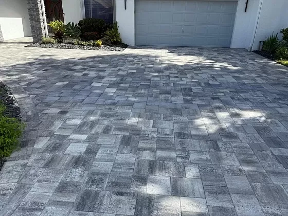 Paver driveway surface prepared for sealing and long-term durability in Palm Beach, FL