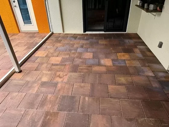 Close-up of patio pavers after re-sanding and sealing in Palm Beach, FL