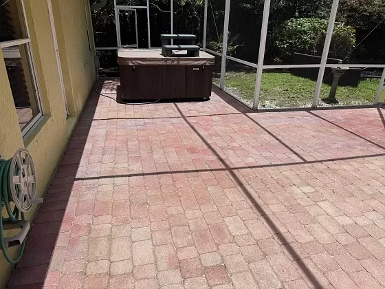 Paver driveway cleaned and sealed for long-term durability in Broward County, FL