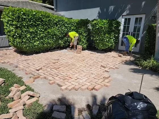 Paver driveway replacement with clean lines in Palm Beach, FL