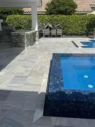 Outdoor patio pavers refreshed through cleaning and re-sanding in Palm Beach, FL