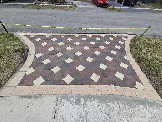 Paver driveway surface re-sanded and prepared for sealing in North Lauderdale, FL