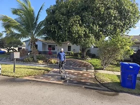 Residential paver driveway after professional paver cleaning in North Lauderdale, FL