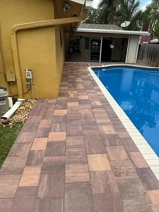 Pool deck pavers refreshed to improve outdoor living comfort in Palm Beach, FL