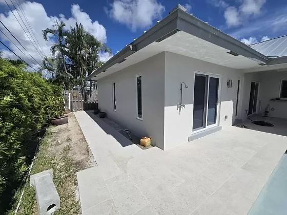 Patio and pool deck pavers forming a seamless outdoor living layout in Jupiter, FL
