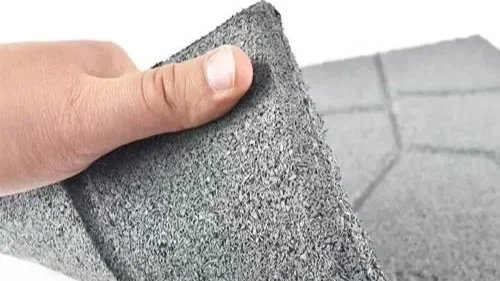 Plastic paving material