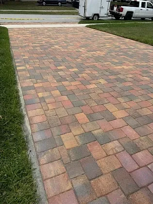 Close-up of pool deck pavers with professional installation in Pompano Beach, FL