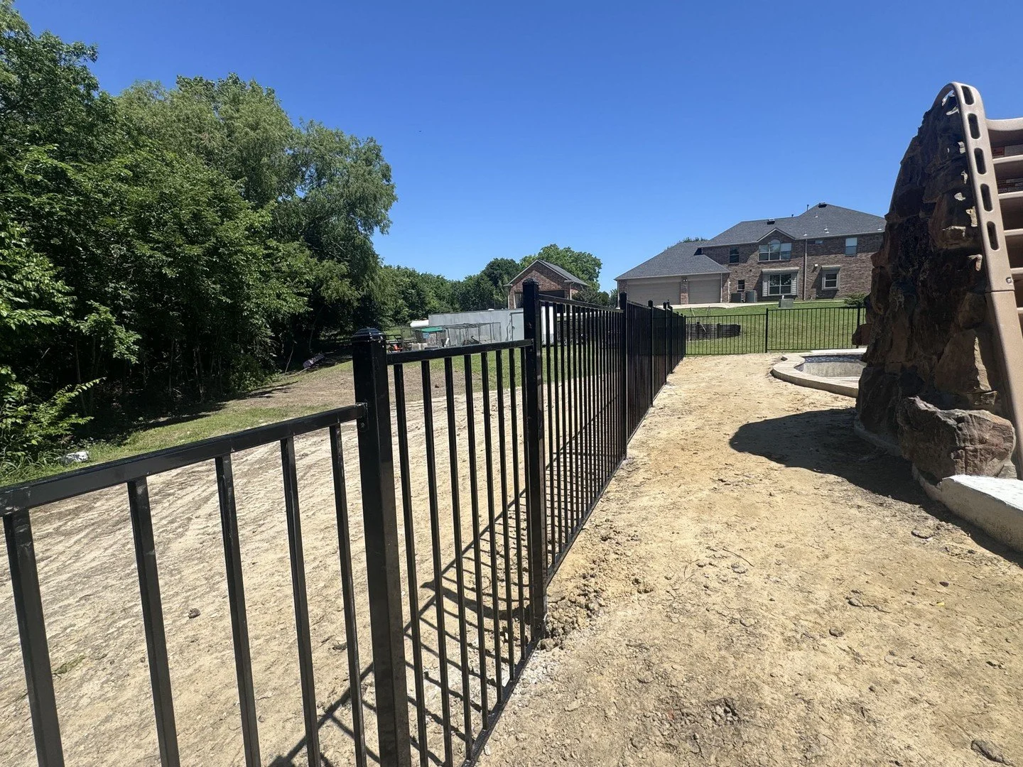 Another clean pool fence installation completed in Wylie, TX. This custom 4&rsquo; wrought iron fence gives the homeowner the security and code compliance they needed around their pool while still maintaining an open, elegant look around the backyard