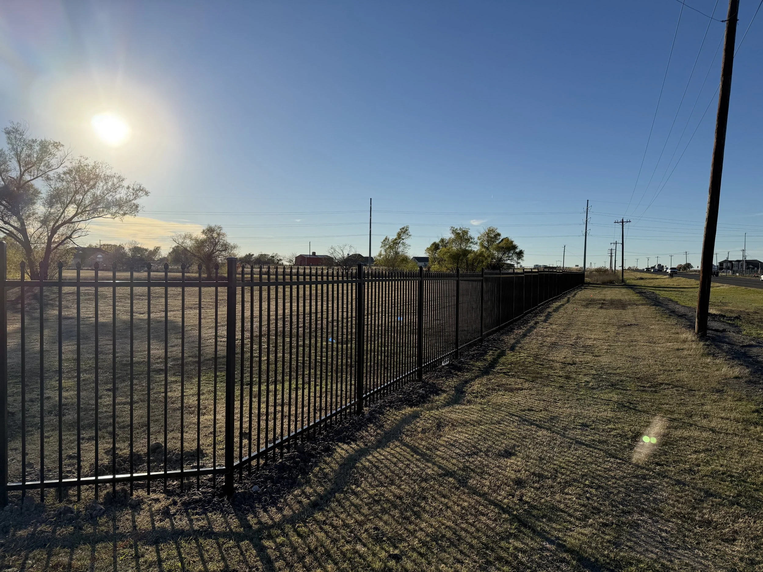 extended picket wrought iron fence