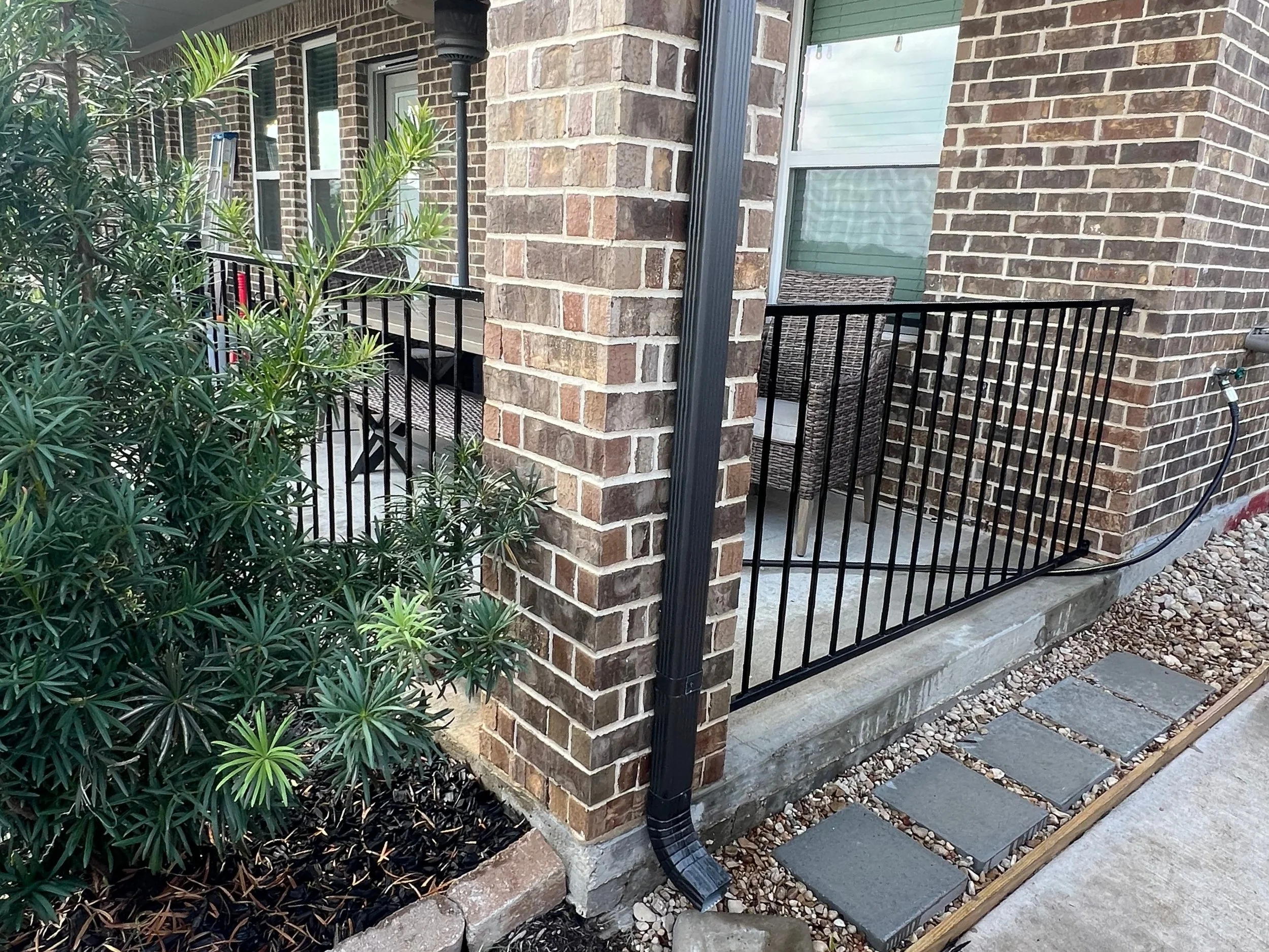 wrought iron fence to enclose patio