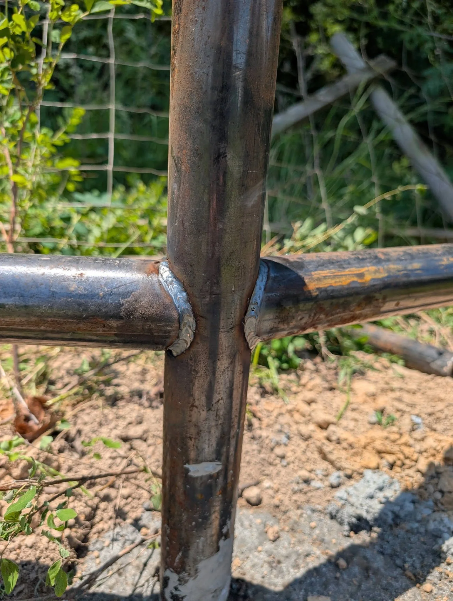 close up of weld quality on pipe fence