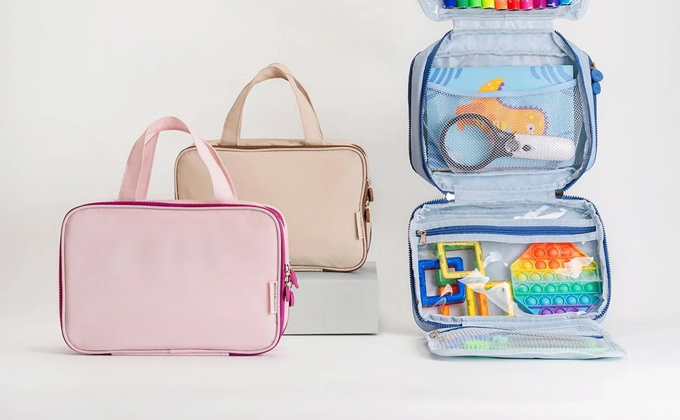 Hanging toddler travel organizer for airplane seats