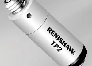 Close-up of a silver rechargeable battery labeled Renishaw TP2.