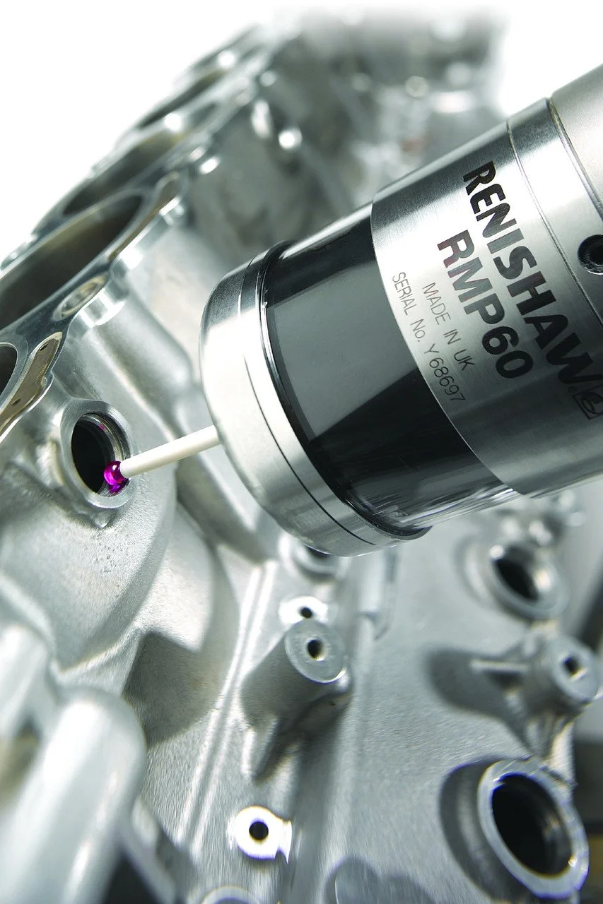 Close-up of a metallic engine component with a nitrogen-filled RVMP 60 canister attached, used for maintenance or nitrogen purging of the engine parts.