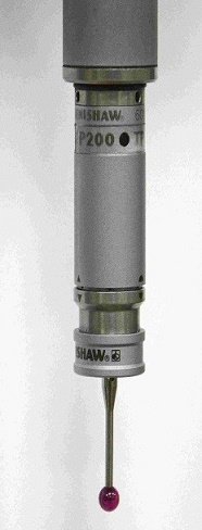 A close-up of a syringe-like device with a purple-tipped needle, labeled 'SHAW' and 'P200'.