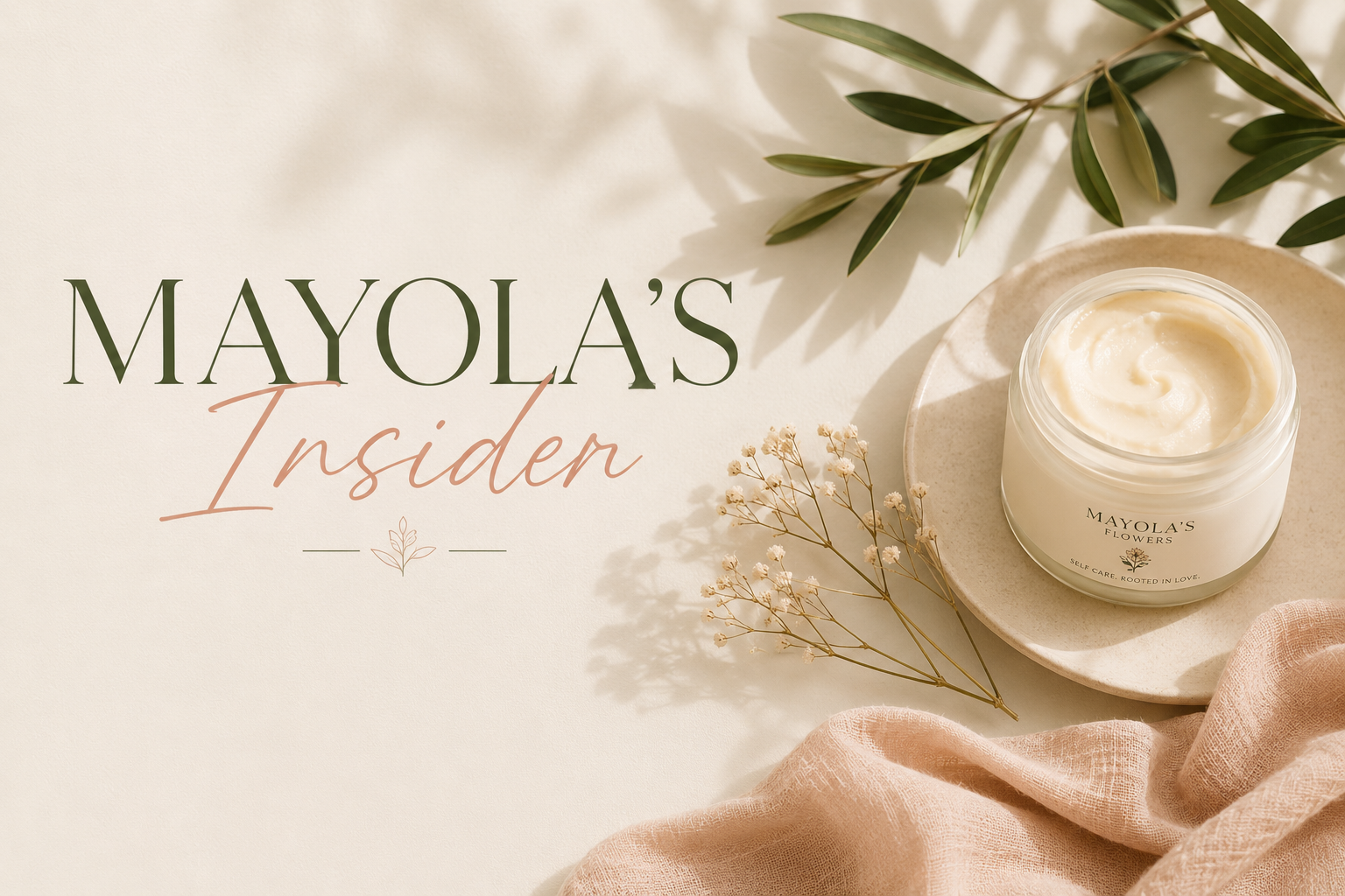 A flat lay of a skincare or candle product on a neutral background with green leaves, dried flowers, and a pink fabric, alongside text that reads 'MAYOLA'S Insider' and 'Self care, rooted in love'.
