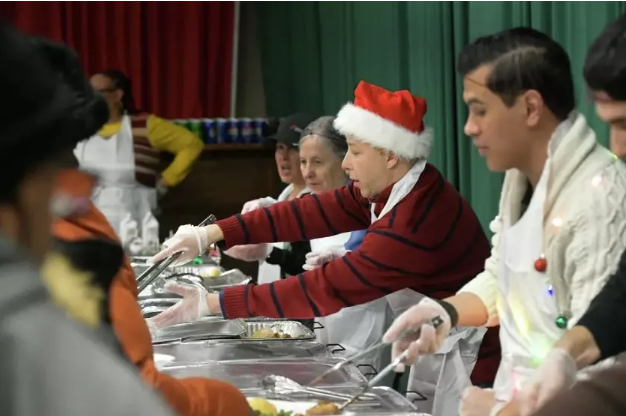 Open Doors welcomes Norwalk community to enjoy a sit-down Christmas meal