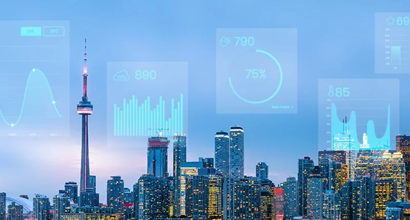 City skyline with tall buildings and multiple digital graphs and data overlays displaying statistics and analytics.