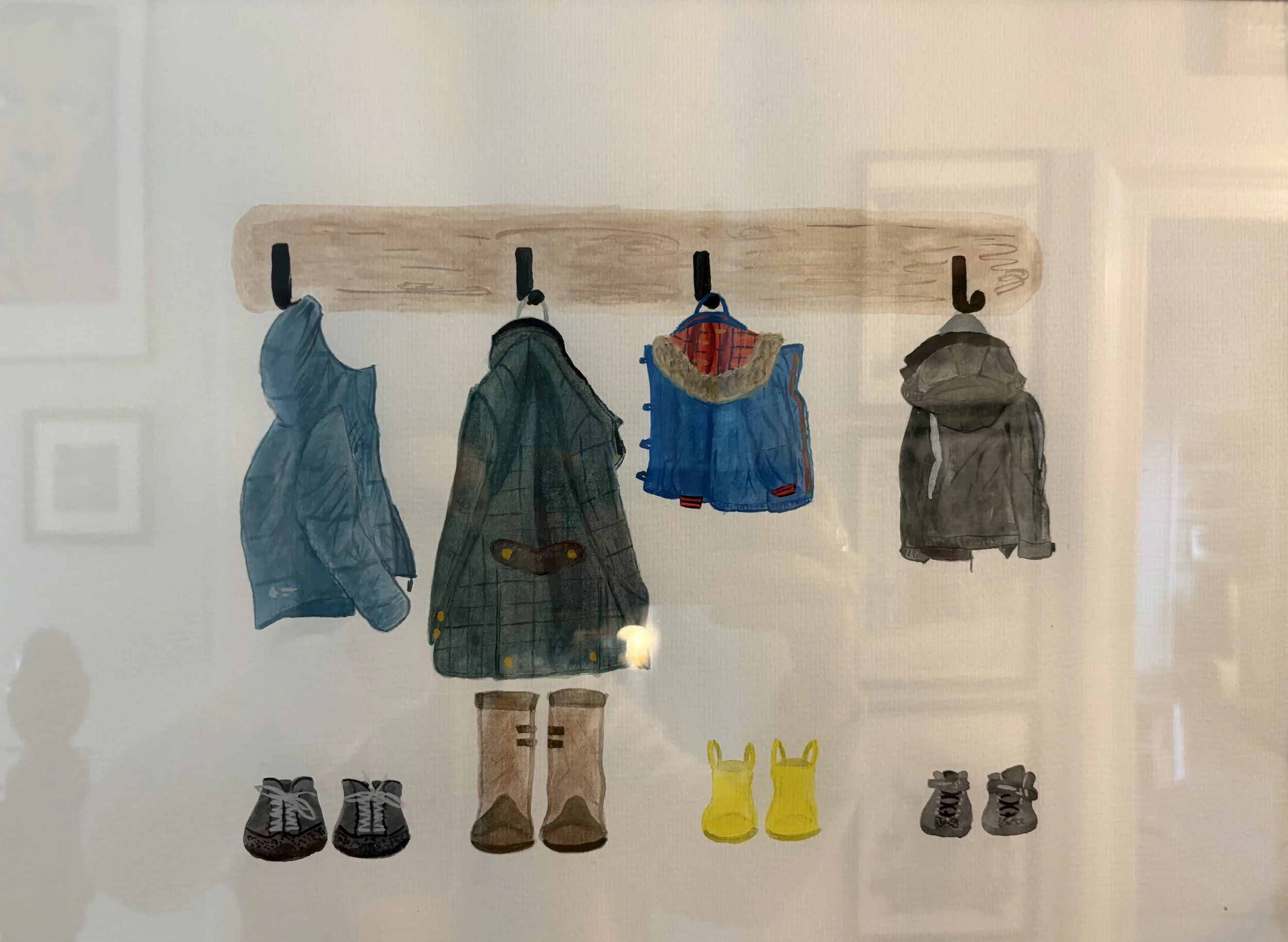 Watercolour on paper of four hanging jackets, coats on hooks, with shoes and boots below on the floor. Resembles a coat cupboard of a family home, jackets and footwear are all for different family members.
