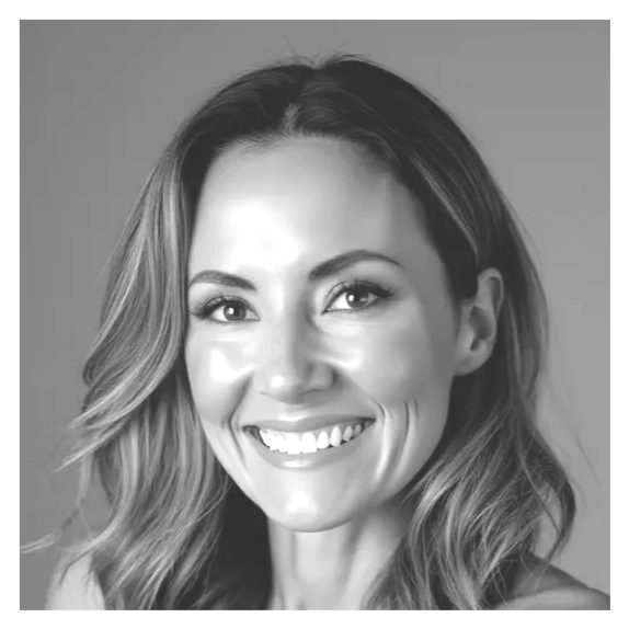 Black and white portrait of a smiling woman with wavy hair