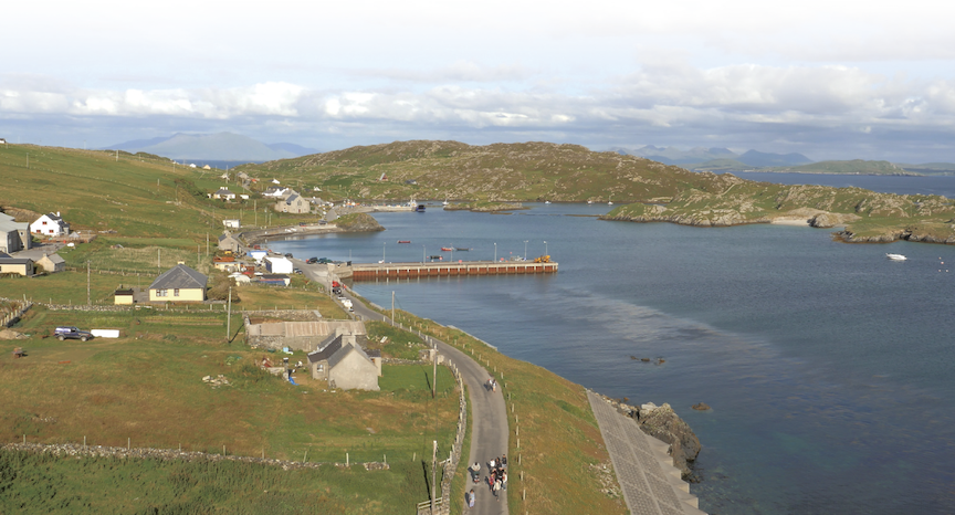 Inishbofin harbour and pier from drone, looking eastward at New Pier towards inner harbour