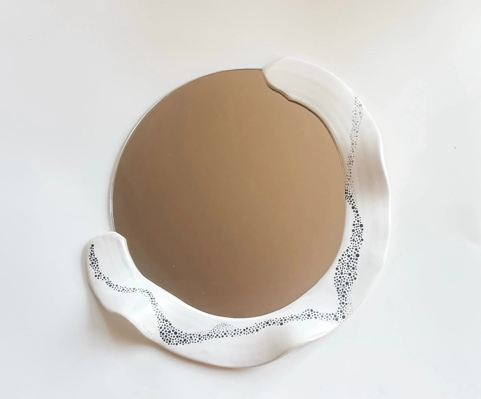Mirror, mirror on the wall.

Count down to the Oxide Show and this beautiful new collection of designer mirrors by  @erinhuppceramics.

The Queen of form meets function, these mirrors are a blend of Erin&rsquo;s signature style, updated into an elega